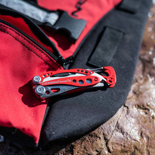 Translation missing: en.Skeletool RX closed on top of a bag