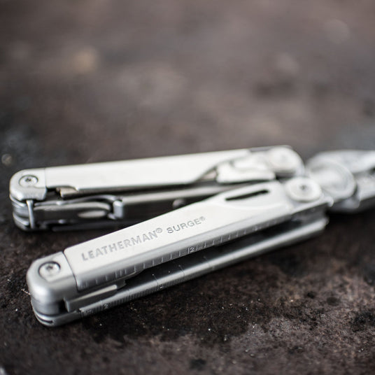 Translation missing: en.Surge open showing pliers laying on the floor