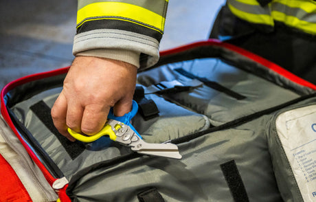 First responder removing Leatherman Raptor shears from bag