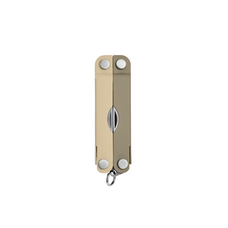 Translation missing: en.Cappuccino Leatherman Micra® multi-tool closed, showcasing its compact design and keychain attachment